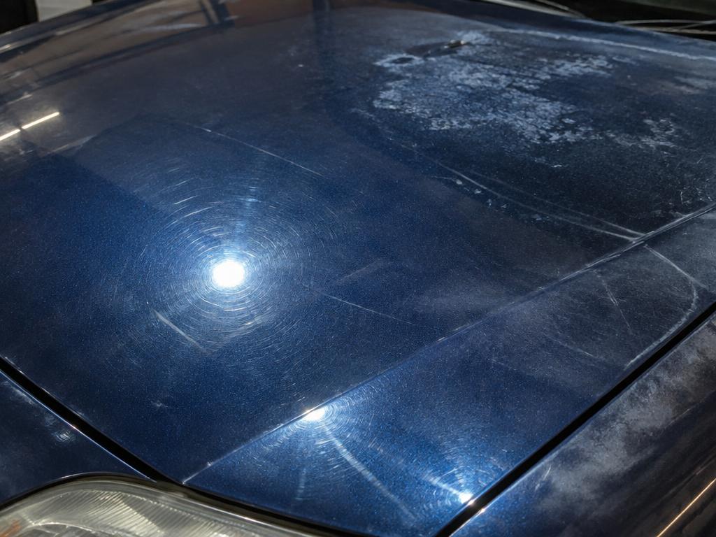 Car hood paint before Two Step Paint Correction